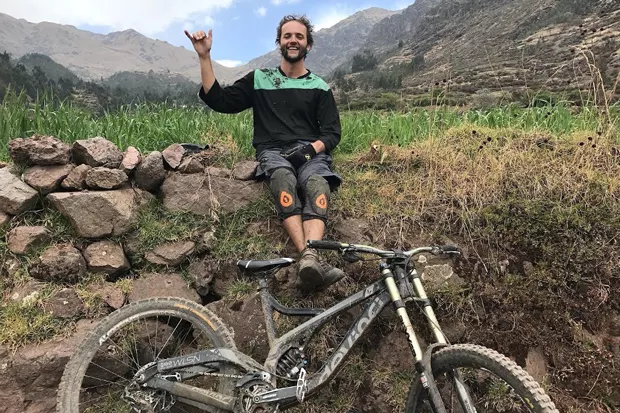 Brian Brunsing enjoying a rest moment while mountain biking. - LINDA ENGLISH