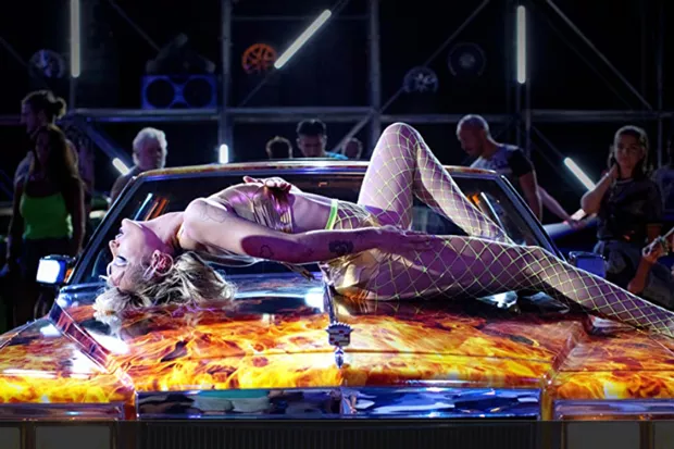 Alexia (played by the brilliant Agathe Rousselle) loves cars maybe a little too much. - PHOTO COURTESY OF NEON