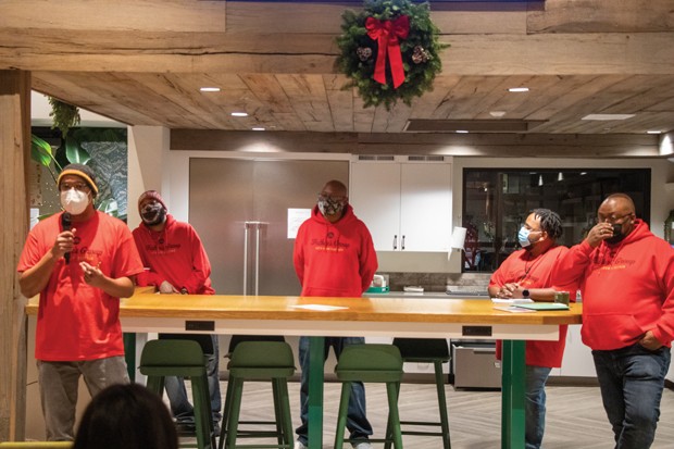 Father's Group members announce recipients of the Deshaun Adderley Scholarship at The Haven Coworking Space on Thursday, Dec. 2. - COURTESY JACK HARVEL