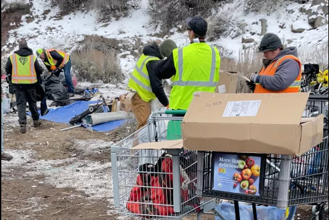 ODOT workers clear a camp on Division Street in February. The person who submitted the photo stressed that ODOT workers were mindful and courteous throughout. - SUBMITTED
