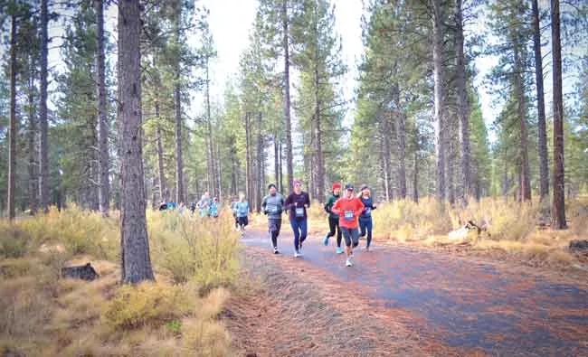 Runners romp through the high desert track at the last in-person event in 2020. - MAX KING