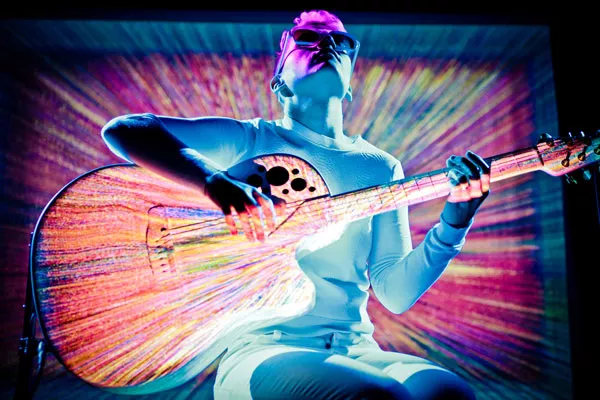 Kaki King uses projection mapping to fuse audio and video in telling the guitar's story. - SIMONE CECCHETTI