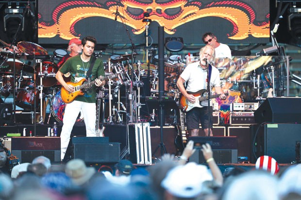 Newbie John Mayer, left, is flanked by original Grateful Dead guitarist Bob Weir, right, and drummers Bill Kreutzmann and Mickey Hart at Saturday's show. - SUBMITTED
