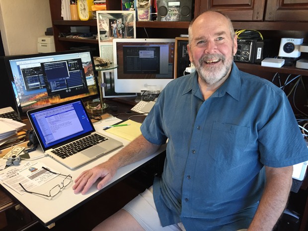 Self-described "schizoclectic" radio programmer Jeff Cotton at his home studio. - LAZLO BLEEN