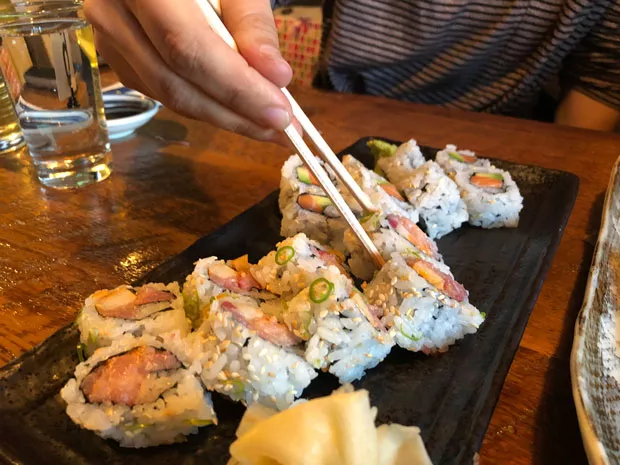 The spicy yellowtail roll delivers a kick for spice lovers. - LISA SIPE