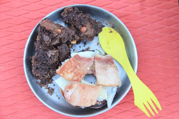 Leftover Dutch oven chocolate cake and savory ham make for a rich and filling breakfast. - K.M. COLLINS