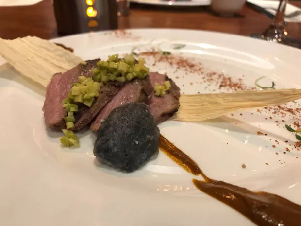 Mexican flying ants were served crushed alongside a deconstructed tamale with mole. - LISA SIPE