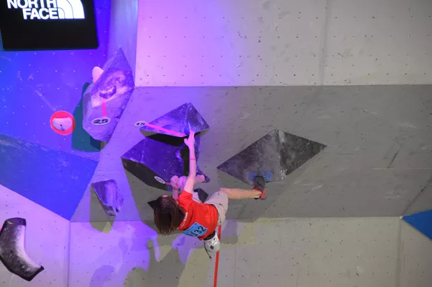 Nathaniel Perullo climbs during a recent competition. - YON PERULLO
