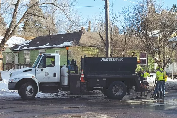 Bend street crews filling potholes. - SOURCE WEEKLY ARCHIVED PHOTO