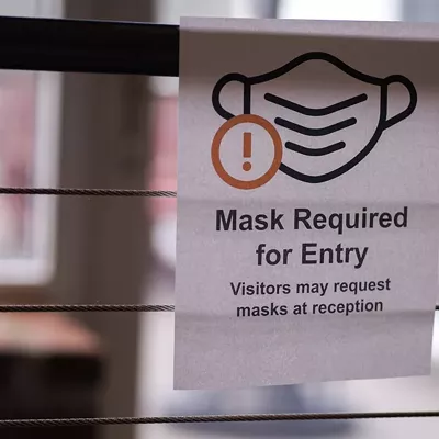 An anti-mask Broward father was arrested Wednesday after shoving a student into a fence at Fort Lauderdale High School.