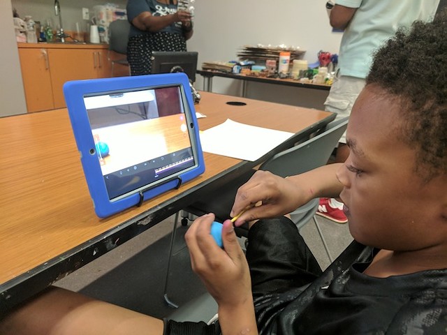 Kaison Ingram, 9, participates in a June Family First workshop on claymation.