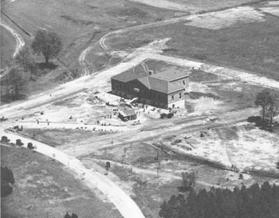 Aerial view of the Mint Museum during moving and construction by WPA