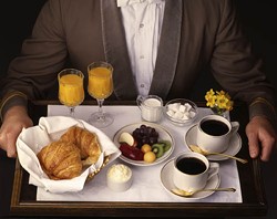 PHOTOS.COM - BED AND BREAKFAST: Many hotels offer a free breakfast with the cost of the room.