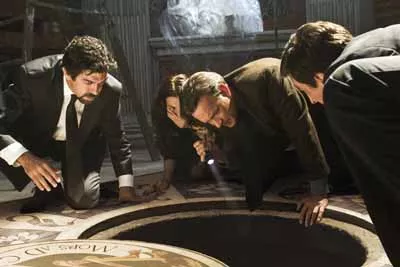 CAN YOU SEE HELL?: Robert Langdon (Tom Hanks) tries to shine a light on the situation in Angels & Demons. (Photo: Columbia)