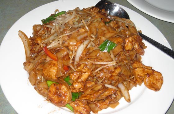 Char Kway Teow - Malaysian pan-fried flat noodles with shrimp and chicken.