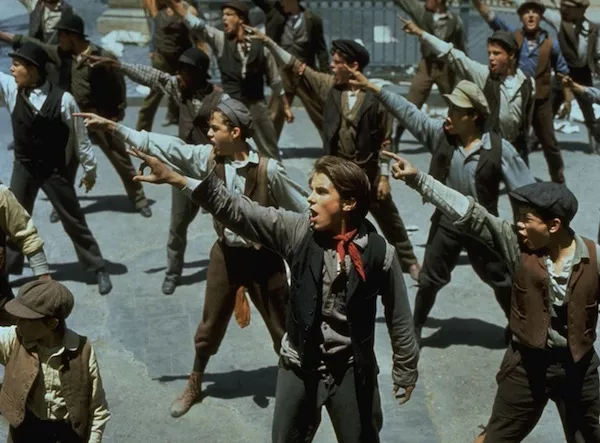 Christian Bale (center) in Newsies (Photo: Disney)