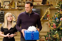 WARNER BROS. - CHRISTMAS LEER: Spending the day with family members puts a strain on the relationship between Kate (Reese Witherspoon) and Brad (Vince Vaughn) in Four Christmases.