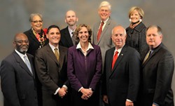 County Commissioners grin and bear it: Cogdell (front row, second from left), Roberts (center).