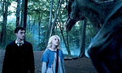 WARNER BROS. &amp; HARRY POTTER PUBLISHING RIGHTS J.K.R. - CREATURE FEATURE: Harry (Daniel Radcliffe) and Luna Lovegood (Evanna Lynch) have a close encounter in Harry Potter and the Order of the Phoenix