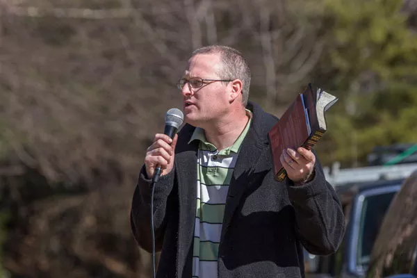 Daniel Parks preaches in front of A Preferred Women's Health Center - GRANT BALDWIN