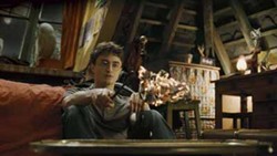 WARNER BROS. PICTURES - FIGHTING FIRE WITH FIRE: Matters heat up for Harry (Daniel Radcliffe) in Harry Potter and the Half-Blood Prince.