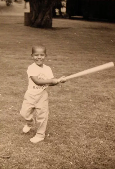 Future President practicing his homerun swing