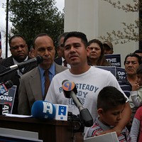 Gabino Sanchez and his family at a March rally outside the Charlotte Immigration Court building, with Illinois Democratic Congressman Luis Gutierrez to his left.
