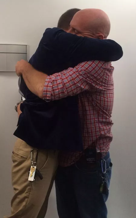 Hewell and Lindsley embrace after being denied a marriage license. - ANA MCKENZIE