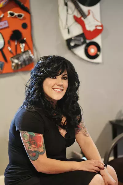 Kymm McLean in front of her latest art project - ASHLEY GOODWIN