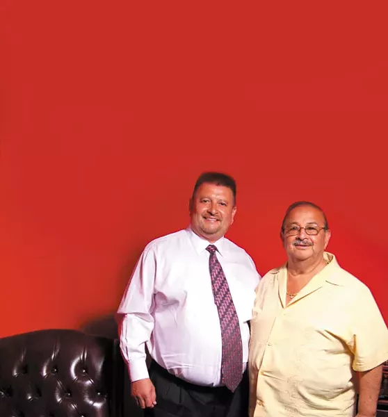 Louis Romero and his father, Carlos Romero. (Photo by Natrice Bullard)