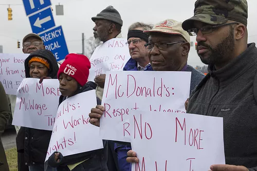 Luis Rodriguez, right, an organizer with Action NC, helped coordinate the protest.