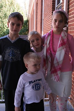 Michelle (right) and her brothers and sister would like to be adopted together - CATALINA KULCZAR