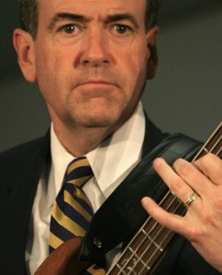 Mike Huckabee and his bass. (Thanks to Aaron Webb for the photo.)