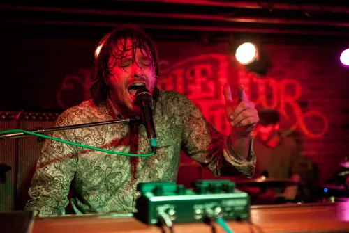 Monophonics singer/keyboardist Kelly Finnigan was dripping with perspiration — his hair and shirt soaked — after the band's first song at the Double Door Inn on May 17, 2012. Concertgoers must have been texting their friends, as people were still entering the venue an hour into the San Francisco group's funk-and-soul set.