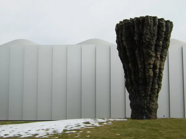 "Ogromna" &#151; sculpture by Ursula von Rydingsvard, a typical new facade in the background. Images by Manoj Kesavan.