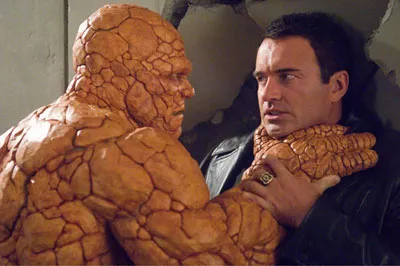 ORANGE CRUSH: Victor Von Doom (Julian McMahon) finds himself stuck between The Thing (Michael Chiklis) and a hard place in Fantastic Four: Rise of the Silver Surfer