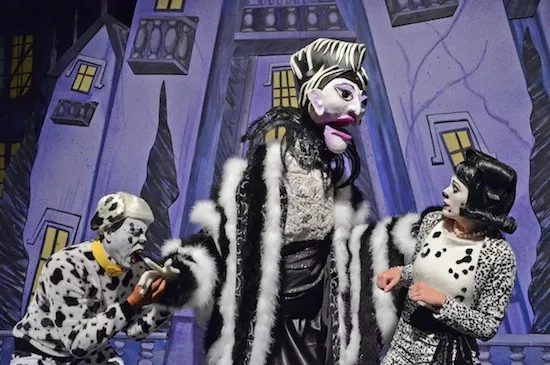 Pongo (Bobby Tyson) and Missis (Maria Buchanan) fight off the evil Cruella De Vil (Lucianne Hamilton) in CTC’s musical version of 101 Dalmatians.