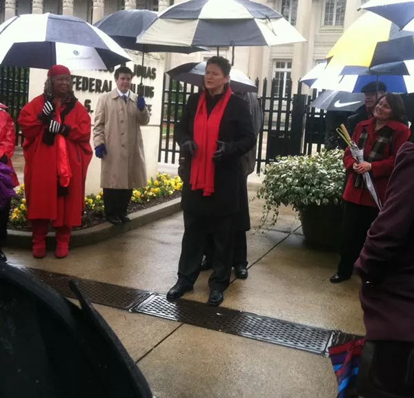 Rev. Christy Snow of the Spiritual Learning Center of Charlotte addresses the crowd.