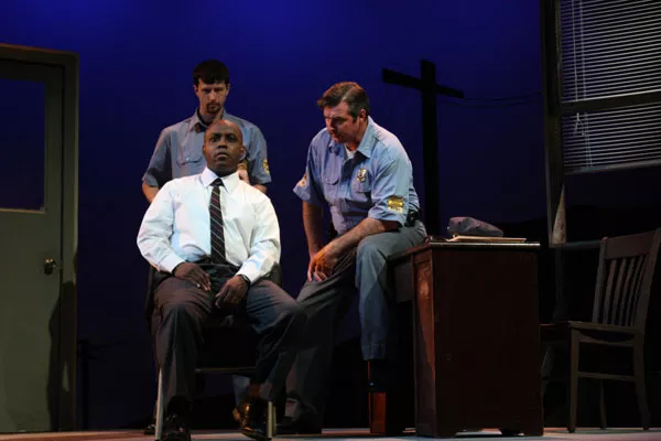 Ron McLelland (seated) as Virgil Tibbs, Robert Crozier (behind Tibbs) as Deputy Sam Wood and Lamar Wilson as Chief Gillespie (Photo: Chris Timmons)