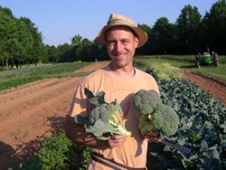 COURTESY OF CFSA &amp; NEW TOWN FARMS - Sammy Koenigsberg of New Town Farms and his organic broccoli