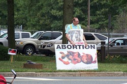 KAREN SHUGART - SAY IT LOUD: A protester stands outside Family Reproductive Health