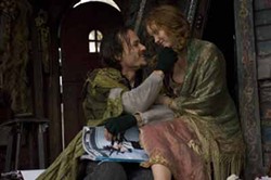 SONY PICTURES CLASSICS - SHOW AND TELL: Heath Ledger and Lily Cole in The Imaginarium of Doctor Parnassus.
