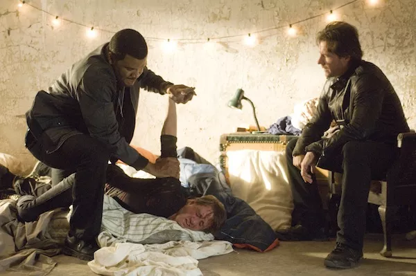 STRONG ARM OF THE LAW: Alex Cross (Tyler Perry) and Tommy Kane (Edward Burns) interrogate a suspect in Alex Cross. (Photo: Summit Entertainment)