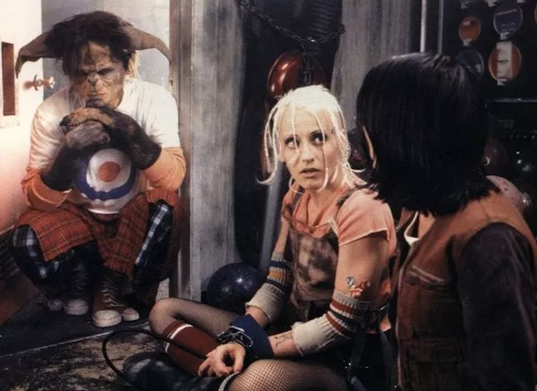 Tank Girl (Lori Petty) and one of her kangaroo-man buddies in Tank Girl (Photo: Shout! Factory)