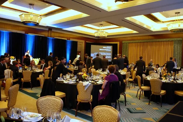 The event was held in a ball room of the Ritz Carlton Hotel in Uptown.