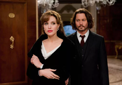 THE GLAMOUROUS LIFE: Johnny Depp and Angelina Jolie in The Tourist. (Photo: Peter Mountain / Columbia)