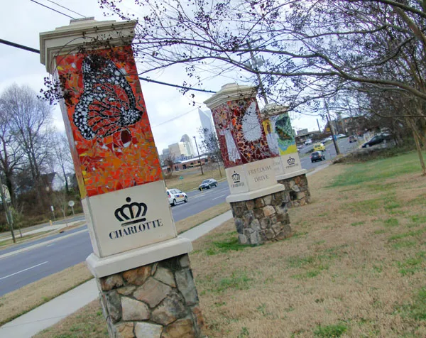 These ceramic and stone kiosks on the far west edge of Wesley Heights (designed by artist Cheryl Foster) welcome residents and visitors to the citys west side