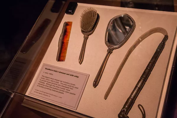 This elegant silver dresser set includes a brush, comb, mirror - and a whip. The whip could be used to punish house servants who displeased their mistress. - JOE MARTIN