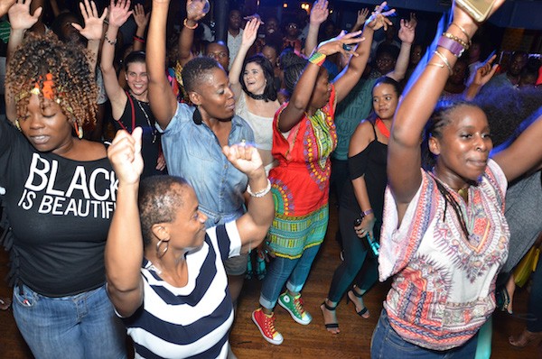 AfroPop partiers raise their hands in the air during the September event at Morehead. (Photo Courtesy of AfroPop! Nation)