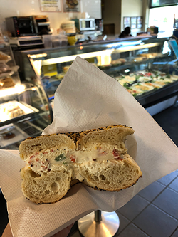 An everything bagel with veggie cream cheese (Photo by Sophie Whisnant)
